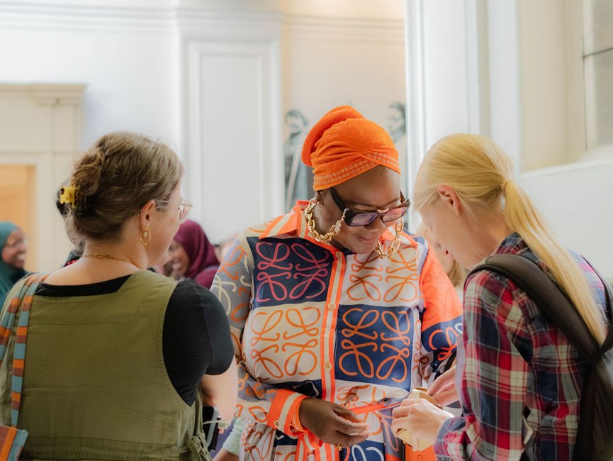 three women in conversation